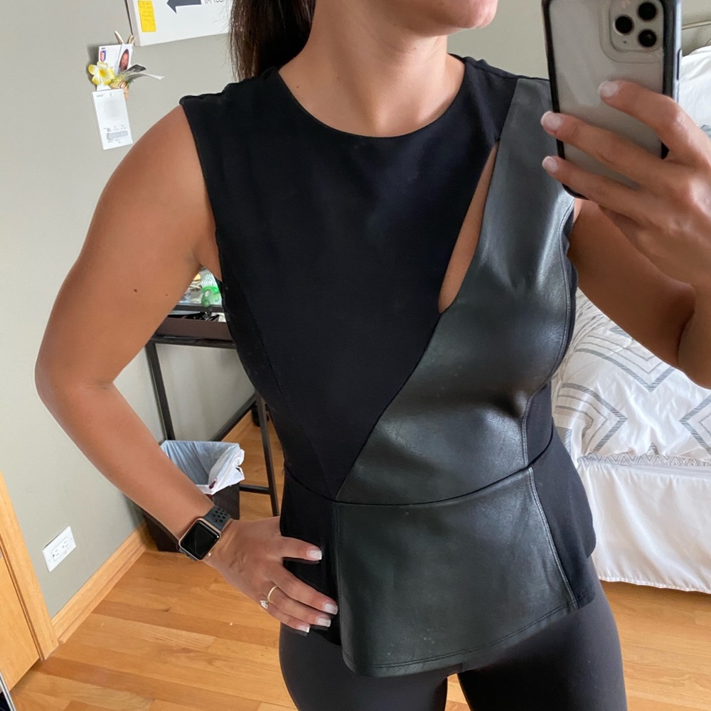 Black Leather BCBG top with slit size XS